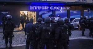 Police in front of hyper cacher store in Paris.