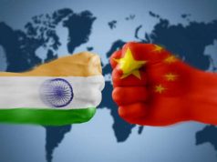 India and China bumping fists