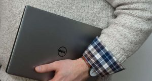 Man holding a laptop