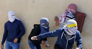 Palestinians throwing rocks